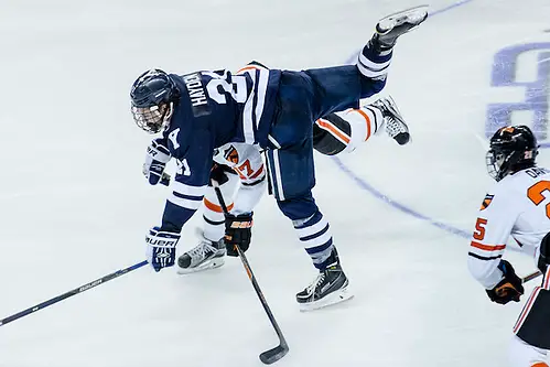 Photo By: Shelley M. Szwast John Hayden (Yale - 21) and Garrett Skrbich (Princeton - 17) battle in the neutral zone. (Shelley M. Szwast)