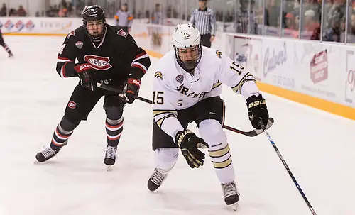 Photo By: Bradley K. Olson Ben Storm (SCSU-4) Scott Moldenhauer (Western Michigan-15) 16 Jan. 22 St. Cloud State University and Western Michigan meet in a NCHC conference match-up at the Herb Brooks National Hockey Center in St. Cloud, MN (Bradley K. Olson)