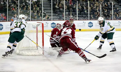 Press Eye - Belfast -  Northern Ireland - 25th November 2016 - Photo by William Cherry Vermont Catamounts' Ross Colton and Brady Shaw with UMass Minutemen's Ryan Wischow and Shane Bear during Friday afternoons Friendship Four game at the SSE Arena, Belfast.  Four teams from the USA are competing in the NCAA mens ice-hockey tournament in the hope of winning the Belpot Trophy. Photo William Cherry/Presseye (©William Cherry / Presseye)