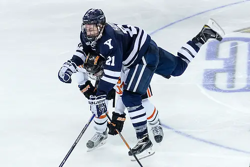 Photo By: Shelley M. Szwast John Hayden (Yale - 21) and Garrett Skrbich (Princeton - 17) battle in the neutral zone. (Shelley M. Szwast)