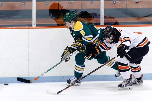 Genevieve Bannon (Clarkson - 9) plays the puck as Molly Strabley (Princeton - 2) gives chase. ((c) Shelley M. Szwast 2016)