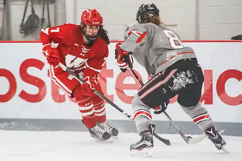 Photo By: Rachel Lewis Sam Cogan (Wisc - 7), Dani Sadek (OSU - 8) The #1 Wisconsin Badgers complete the sweep over the Ohio State Buckeyes with a 5-0 win Saturday, December 10, 2016 at the OSU Ice Rink in Columbus, OH. (Rachel Lewis)