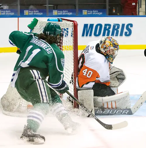 Jordan Ruby (40 - RIT) makes a save on a shot by Jonathan Charbonneau (11 - Mercyhurst) (Omar Phillips)