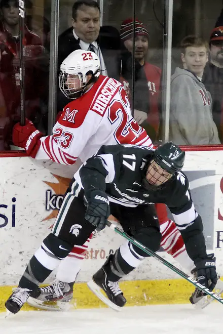 10 Mar 12: Matt Crandell (MSU - 17), Alden Hirschfeld (Miami - 23) Miami University sweeps Michigan State University at Steve Cady Arena in Oxford, OH in Round 2 of the CCHA Playoffs to advance to the semi-finals in Detroit. 10 Mar 12: Matt Crandell (MSU - 17), Alden Hirschfeld (Miami - 23) Miami University sweeps Michigan State University at Steve Cady Arena in Oxford, OH in Round 2 of the CCHA Playoffs to advance to the semi-finals in Detroit. (©Rachel Lewis)