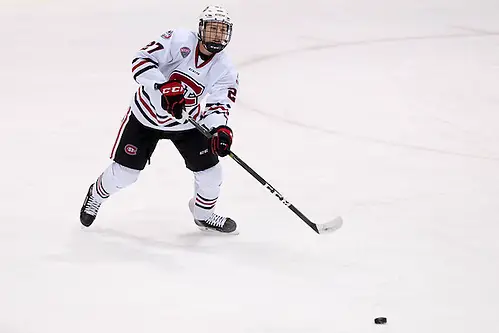 Photo By: Jim Rosvold 9 Jan 16: Dennis Cholowski (St. Cloud - 27). The St. Cloud State University Huskies host the University of Nebraska-Omaha Mavericks in a NCHC matchup at the Herb Brooks National Hockey Center in St. Cloud, MN. (Jim Rosvold)