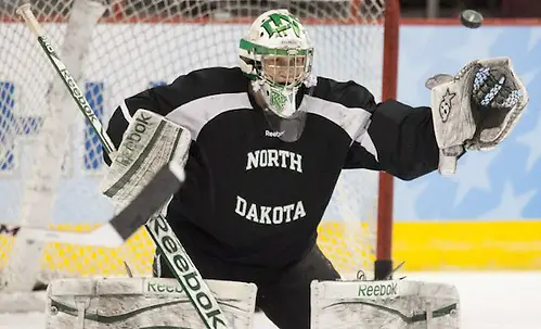 Matt Hrynkiw (UND - 30) Matt Hrynkiw (UND - 30) - The University of North Dakota players practiced at Philadelphia's Wells Fargo Arena on Wednesday, April 9, 2014, to prepare for their 2014 Frozen Four semi-final on Thursday. (Melissa Wade)