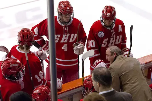 Photo By: Shelley M. Szwast Sacred Heart Head Coach CJ Marottolo (Northeastern '89) talks to his players during a time out. (Shelley M. Szwast)