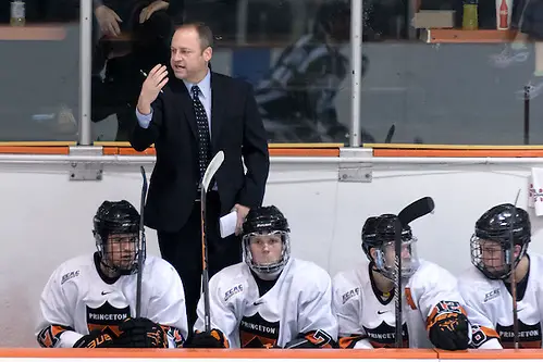 Princeton Head Coach Ron Fogarty (Colgate '95) motions to players prior to a face off. (Shelley M. Szwast)