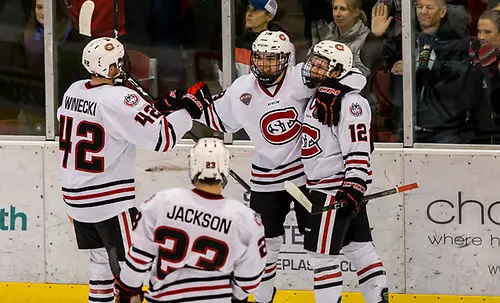Judd Peterson (SCSU-18) Jack Ahcan (SCSU-12)  Blake Winiecki (SCSU-42) 2017 Nov. 4 The St.Cloud State University Huskies host the University of Minnesota Duluth Bulldogs in a NCHC matchup at the Herb Brooks National Hockey Center in St. Cloud, MN (Bradley K. Olson)