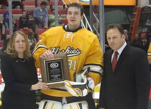 Photo By: Matt Mackinder Michigan Tech goaltender Pheonix Copley accepts the MVP award at the 2012 Great Lakes Invitational in Detroit. The sophomore signed with the Washington Capitals on March 19, 2014. (Matt Mackinder)