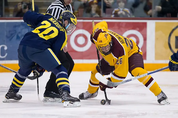 14 Jan 16: Cooper Marody (Michigan - 20), Darian Romanko (Minnesota - 26). The University of Minnesota Golden Gophers host the University of Michigan Wolverines in a B1G matchup at Mariucci Arena in Minneapolis, MN. (Jim Rosvold)