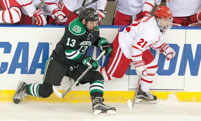 Mike Gornall (North Dakota-13) Patrick Harper (Boston University-21) 24 March 17 University of North Dakota and Boston University meet in the NCAA West Region at Scheels Arena Fargo, ND (Bradley K. Olson)