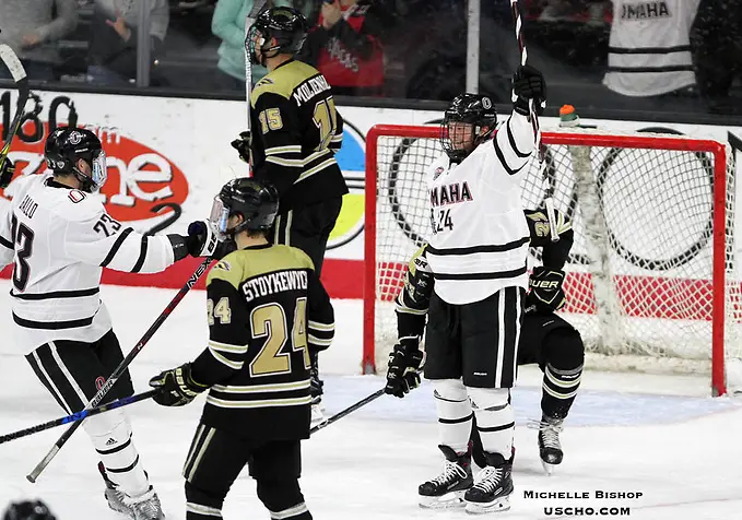 Omaha's Cole Pickup (24) celebrates his first collegiate goal after scoring an empty-netter during the third period. Omaha beat Western Michigan 6-2 Friday night at Baxter Arena. (Photo by Michelle Bishop) (Michelle Bishop)