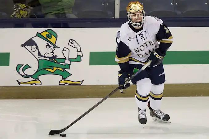 10 Oct 14: Jordan Gross (Notre Dame - 3) The University of Norte Dame Fighting Irish host the Rensslaer Polytechnic Institute in the second game of the 2014 Icebreaker at the Compton Family Ice Center in South Bend, IN. (Jim Rosvold)