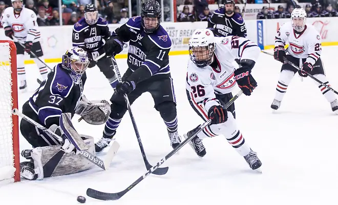 Connor LaCouvee (MSU-37) Easton Brodzinski (SCSU-26) Jarred Spooner (MSU-11) 2018 Jan. 12 The St.Cloud State University Huskies host Mankato State University n a non conference matchup at the Herb Brooks National Hockey Center in St. Cloud, MN (Bradley K. Olson)