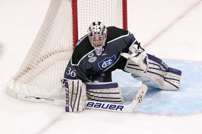 Photo By: Omar Phillips Paul Berrafato (36 - Holy Cross) had 27 saves in a 4-0 win at RIT (Omar Phillips)