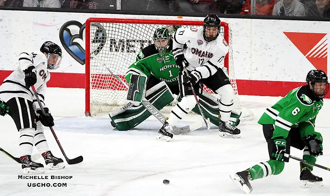 Omaha's Teemu Pulkkinen (14) sets to redirect a shot for a power-play goal during the second period. Omaha beat North Dakota 6-3 Friday night at Baxter Arena. (Photo by Michelle Bishop) (Michelle Bishop)