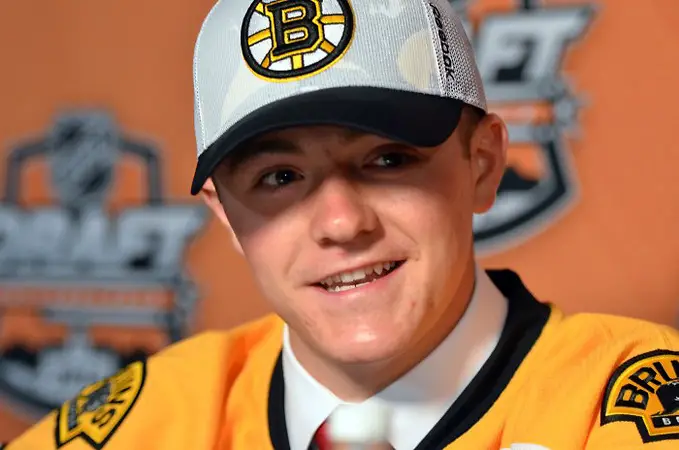 Photo By: Dan Hickling Harvard recruit Ryan Donato talks after being selected in the 2014 NHL Entry Draft. (Dan Hickling)