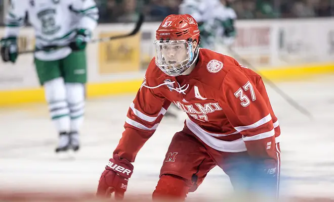 Josh Melnick (Miami of Ohio-37) 17 Jan.14 Miami of Ohio Redhawks and University of North Dakota meet in a NCHC conference match-up at the Engelsted Arena Grand Forks, ND (Bradley K. Olson)