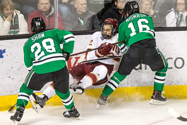 Photo By: Bradley K. Olson Hayden Shaw (North Dakota-28) Erich Fear (Denver-2 ) Grant Mismash (North Dakota-16) 2018 Jan. 27 The University of North Dakota hosts Denver University in a NCHC matchup at the Ralph Engelstad Arena in Grand Forks, ND (Bradley K. Olson)