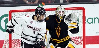 ASU goalie Joey Daccord catches the puck during the third period. Omaha and Arizona State tied 4-4 Saturday night at Baxter Arena. (Photo by Michelle Bishop) (Michelle Bishop)