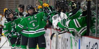 27 Oct 18: The University of North Dakota Fighting Hawks host the University of Minnesota Golden Gophers in the 2018 US Hockey Hall of Fame Game at Orleans Arena in Las Vegas, NV. Photo: Jim Rosvold/University of Minnesota (Jim Rosvold/University of Minnesota)