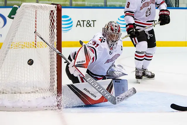 Photo By: 2017 Omar Phillips Cayden Primeau (31 - Northeastern) makes a third period save (2017 Omar Phillips)