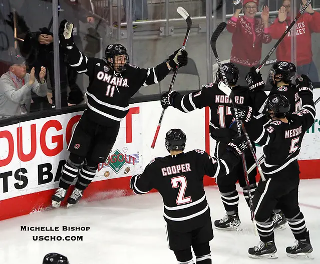 Photo By: Michelle Bishop Omaha celebrates Mason Morelli's (11) goal during the second period. Omaha beat Western Michigan 6-3 Saturday night at Baxter Arena. (Photo by Michelle Bishop) (Michelle Bishop)