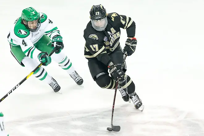 Andrew Peski (North Dakota-4) Wade Allison (Western Michigan-17) 2018 November 17 The University of North Dakota hosts Western Michigan in a NCHC matchup at the Ralph Engelstad Arena in Grand Forks, ND (Bradley K. Olson)