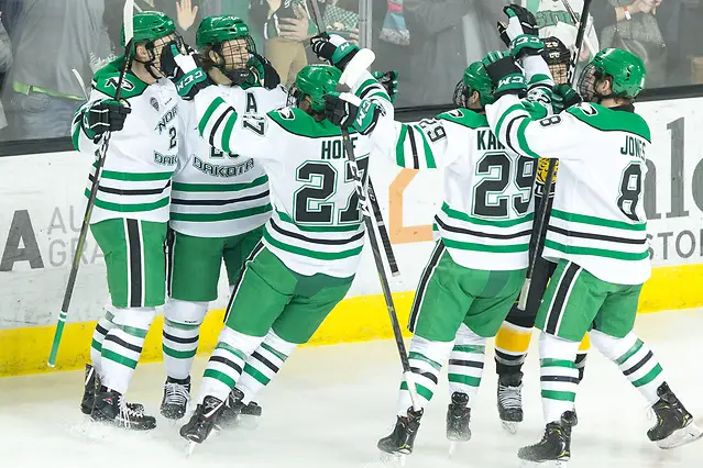 North Dakota celebrates the sweep of Colorado College. 2019 January 12 University of North Dakota hosts Colorado College in a NCHC matchup at the Ralph Engelstad Arena in Grand Forks, ND (Bradley K. Olson)