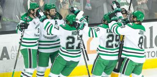 North Dakota celebrates the sweep of Colorado College. 2019 January 12 University of North Dakota hosts Colorado College in a NCHC matchup at the Ralph Engelstad Arena in Grand Forks, ND (Bradley K. Olson)