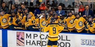 Canisius players celebrate a goal by David Parrottino (9 - Canisius) (2019 Omar Phillips)
