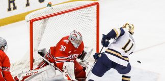 17 MAR 2018: Sean Romeo (OSU - 30), Cal Burke (ND - 11). The University of Notre Dame Fighting Irish host the Ohio State University in the 2018 B1G Championship at Compton Family Ice Arena in South Bend, IN. (Rachel Lewis - USCHO) (Rachel Lewis/©Rachel Lewis)