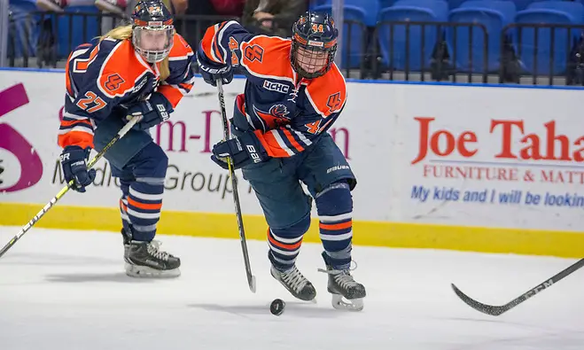 Rebecca Brown (on left) and Olivia Hirschy (on right) lead Utica (Utica Athletics)