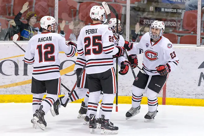 Robby Jackson (SCSU-23) Nick Perbix (SCSU-25) Jack Ahcan (SCSU-12) 2019 February 9 St. Cloud State University hosts Colorado College in a NCHC contest at the Herb Brooks National Hockey Center (Bradley K. Olson)