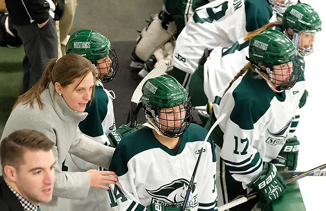 Melissa Lomanto behind the bench with the Morrisville Mustangs (Morrisville Athletics)