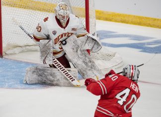 29 Mar 19: The Denver University Pioneers play against the Ohio State University Buckeyes in a 2019 West Regional semifinal matchup at Scheels Arena in Fargo, ND. (Jim Rosvold)
