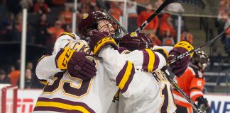 UMD players celebrate a late third period goal (2019 Omar Phillips)