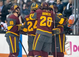 Arizona State players celebrate an early first period goal in a 6-1 win at RIT (2019 Omar Phillips)