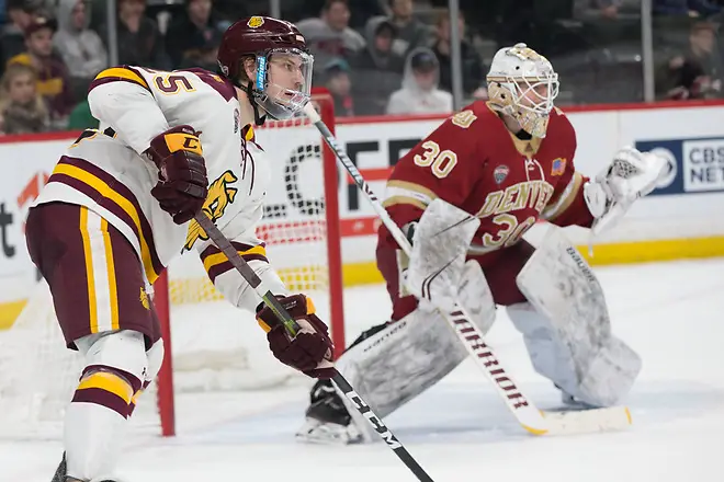 Photo By: Bradley K. Olson Peter Krieger (Minnesota-Duluth-25) Filip Larsson (Denver-30) 2019 March 22 Denver and University of Minnesota Duluth meet in the semi finals of the NCHC Frozen Face Off at the Xcel Energy Center in St. Paul, MN (Bradley K. Olson)