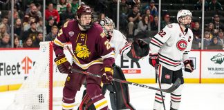 Riley Tufte (Minnesota-Duluth-27 David Hrenak (SCSU-34) 2019 March 23 University of Minnesota Duluth and St. Cloud State University meet in the championship game of the NCHC Frozen Face Off at the Xcel Energy Center in St. Paul, MN (Bradley K. Olson)