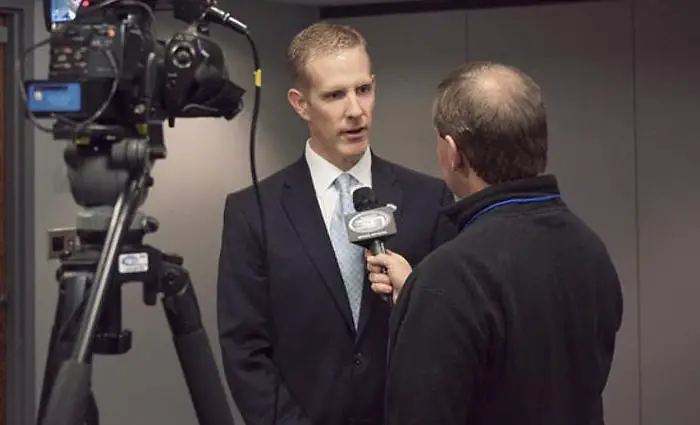 NCHC commissioner Josh Fenton gets interviewed at 2013 media day. (NCHC)