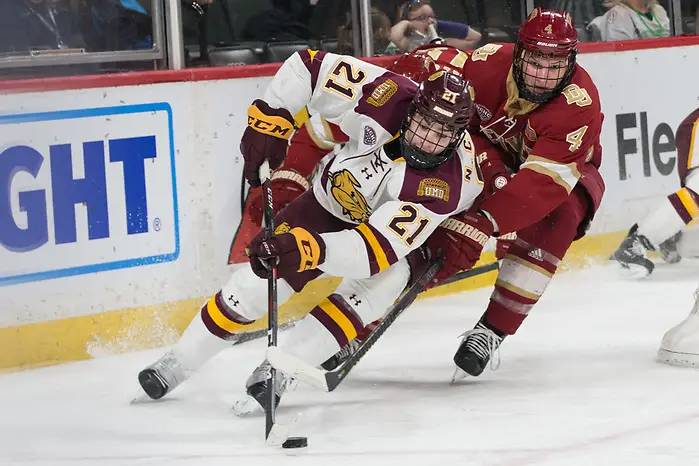 Noah Cates (University of Minnesota Duluth -21 ) Griffin Mendel (Denver-4) 2019 March 22 Denver and University of Minnesota Duluth meet in the semi finals of the NCHC  Frozen Face Off at the Xcel Energy Center in St. Paul, MN (Bradley K. Olson)