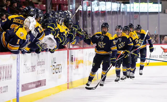 AMHERST, MA - NOVEMBER 22: Hugo Esselin #15 of the Merrimack College Warriors celebrates his goal with his teammates against the Massachusetts Minutemen during NCAA men's hockey at the Mullins Center on November 22, 2019 in Amherst, Massachusetts. The game ended in a 2-2 tie. (Photo by Rich Gagnon/USCHO) (Rich Gagnon)