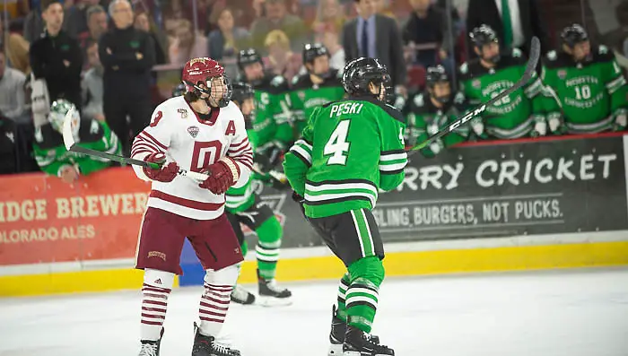 Tyson McLellan of Denver looks up ice, North Dakota vs. Denver at Magness Arena, Nov. 15, 2019. (Candace Horgan)