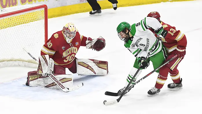 February 15, 2020 a NCAA men's ice hockey game between the Denver Pioneers and the University of North Dakota at Ralph Engelstad Arena, Grand Forks, ND. Photo by Russell Hons (Russell Hons)