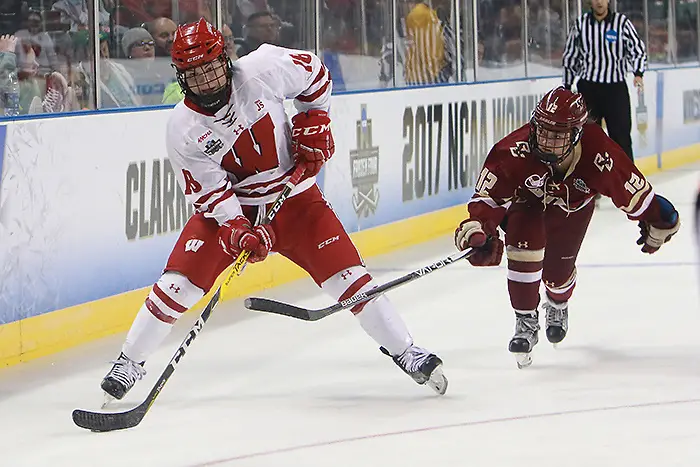 Abby Roque (Wisconsin-18) and Kenzie Kent (Boston College-12) in a semifinal game during the 2017 NCAA Frozen Four at Family Arena in St. Charles, Mo. (Don Adams Jr.)