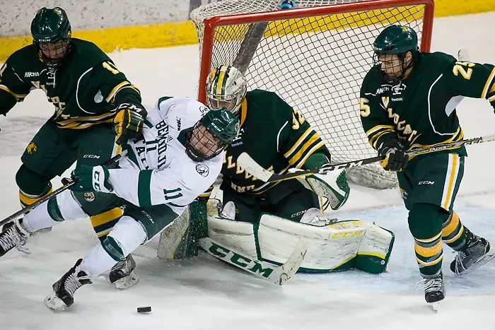08 Dec 17: Adam Rockwood (Northern Michigan - 11), Charlie Combs (Bemidji State - 11), Mathias Israelsson (Northern Michigan - 32), Philip Beaulieu (Northern Michigan - 25). The Bemidji State University Beavers host the Northern Michigan University Wildcats in a WCHA Conference matchup at the Sanford Center in Bemidji, MN. (Jim Rosvold)
