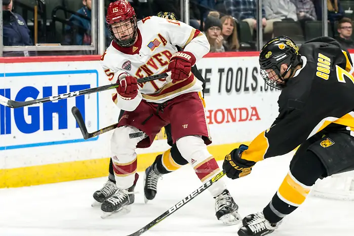 Ian Mitchell (Denver-15) Trevor Gooch (Colorado College-2) 2019 March 23 Denver and Colorado College meet in the 3rd place game of the NCHC Frozen Face Off at the Xcel Energy Center in St. Paul, MN (Bradley K. Olson)